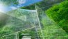 Sustainable glass office building with trees for reducing carbon dioxide.